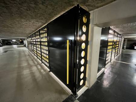 Réalisation et mise en place d’un local vélo en tôles perforées acier au parking Lyon Parc Auto à Lyon.